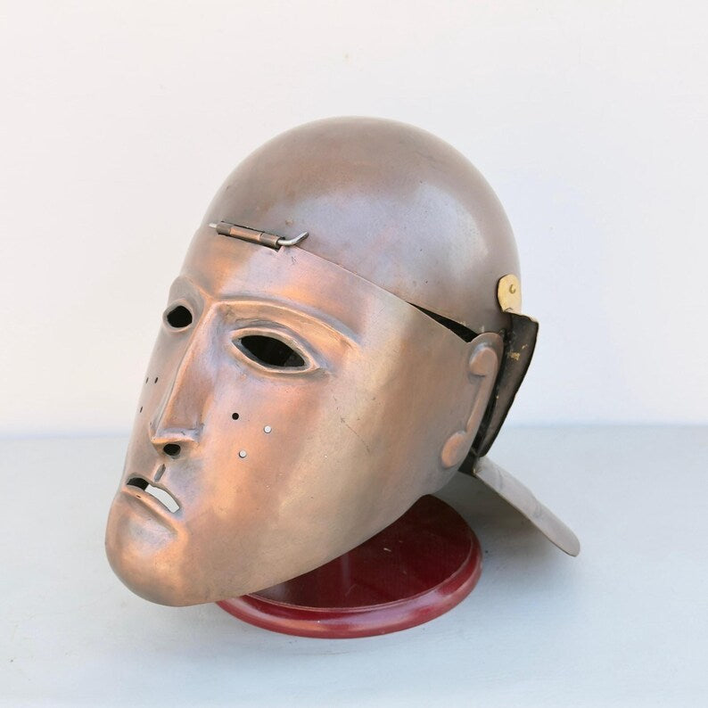 Close-up of leather suspension and chinstraps on medieval Roman cavalry face helmet for costume use