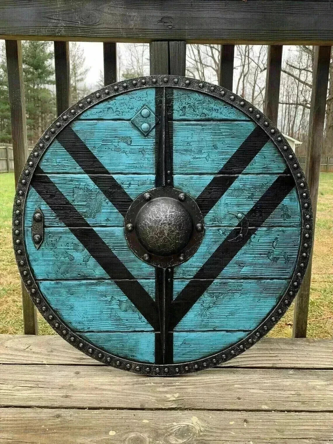 Close-up of steel and wood craftsmanship on medieval Viking shield