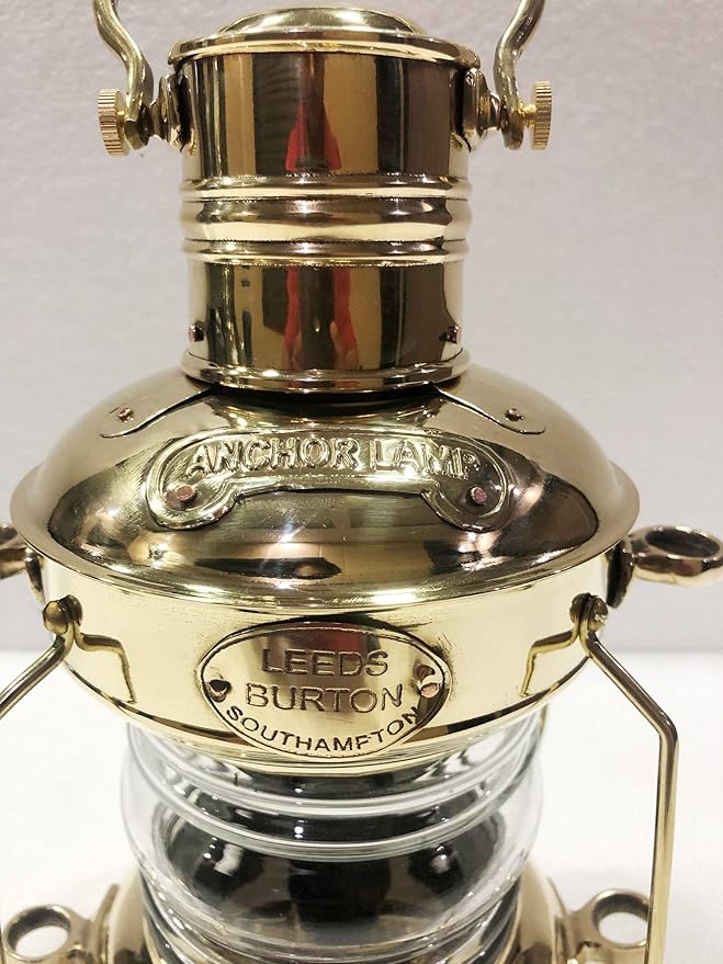 Brass lantern used for nautical home décor lighting with polished gold finish