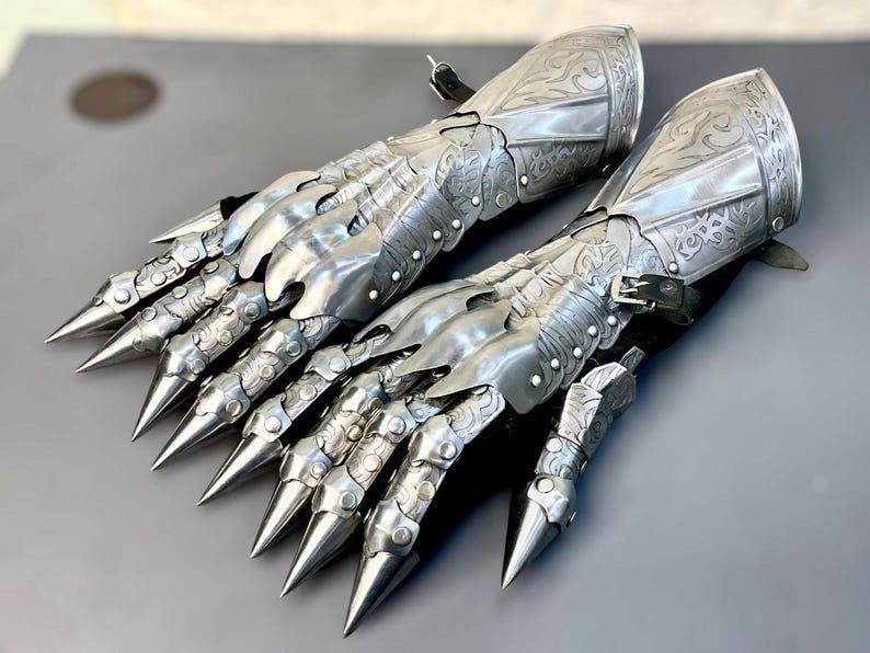 Nazgul-inspired etched gauntlet gloves with silver finish for medieval cosplay and LARP