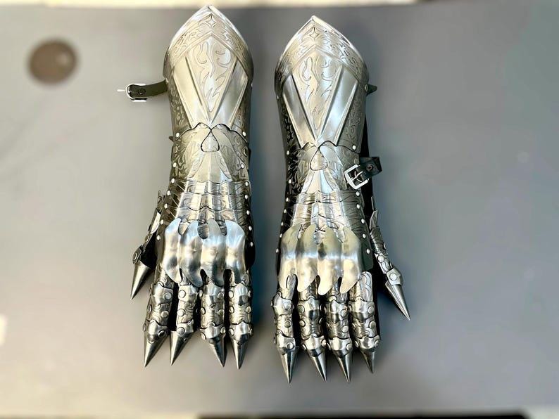 Nazgul-inspired cosplay gloves on display stand, ideal for collectors and fantasy costumes
