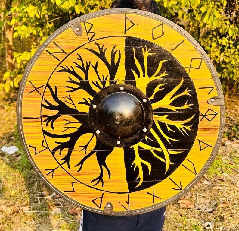 Handmade wooden Viking shield with tree design used as wall decor