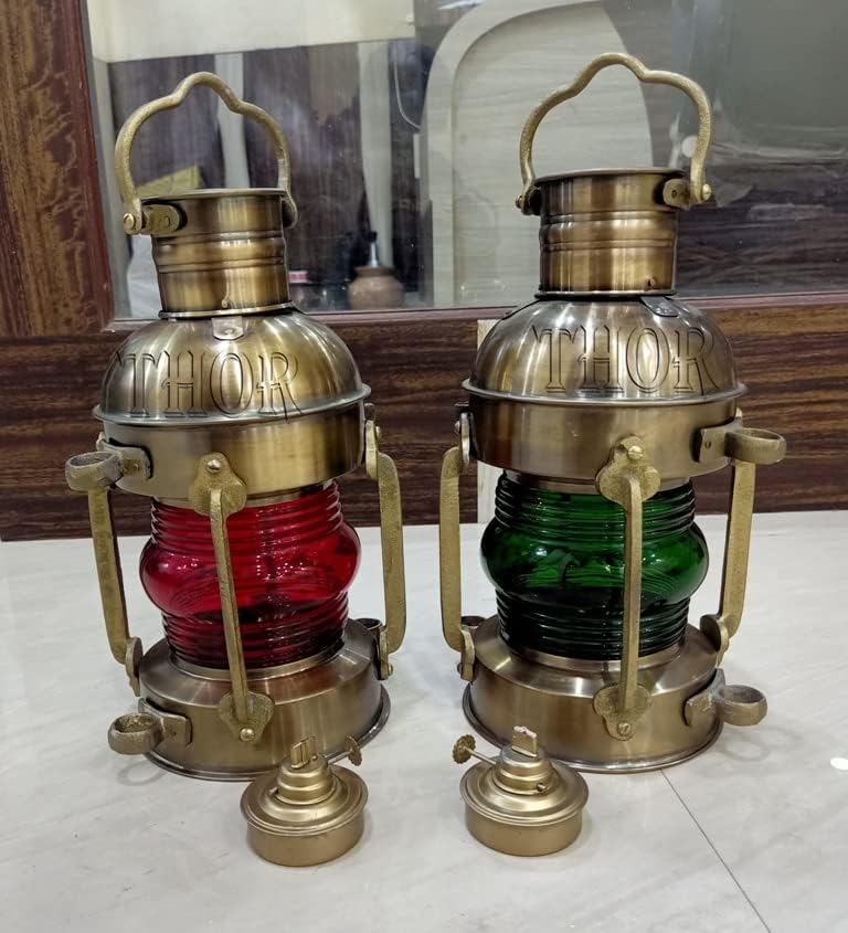 Close-up of oil-powered antique naval lantern with iron and glass construction