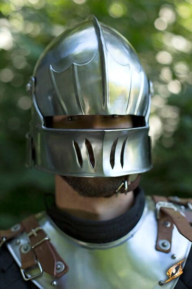 Side profile of polished steel medieval helmet for cosplay or LARP