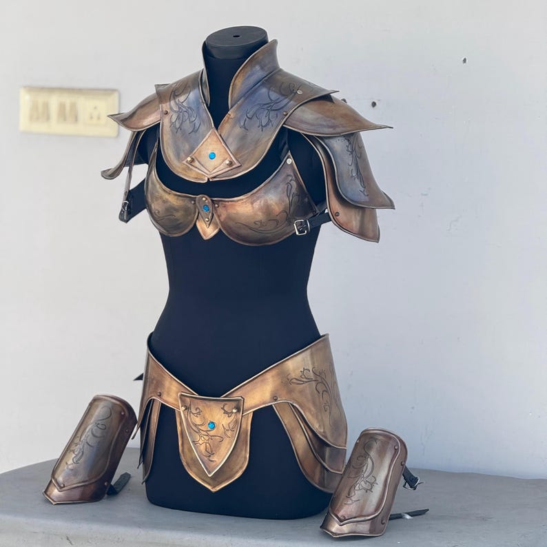 Detailed view of pauldrons and gorget on Queen of the Elven lady armor polished steel suit