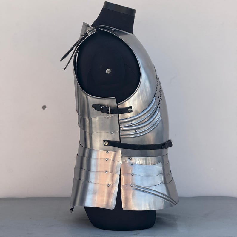 Gothic cuirass armor displayed on stand, ideal for medieval reenactments and theatrical performances.