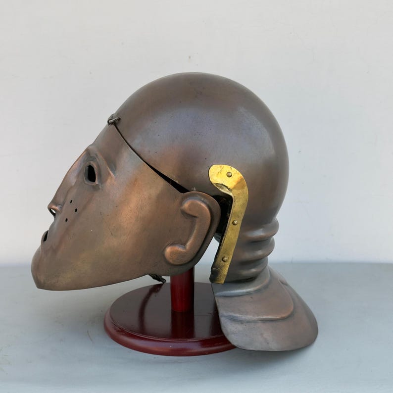 Side angle of medieval Roman cavalry helmet with antique copper finish for reenactment and LARP