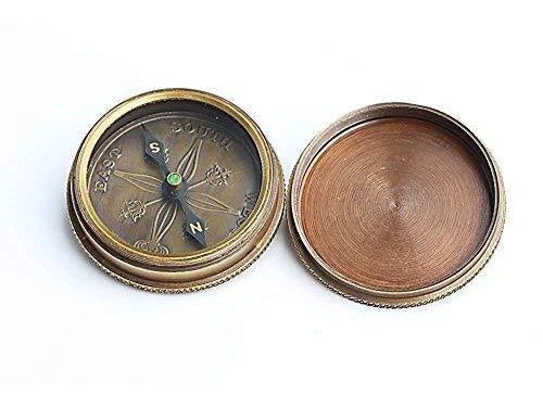 Open view of RII compass showing detailed rose dial for nautical navigation