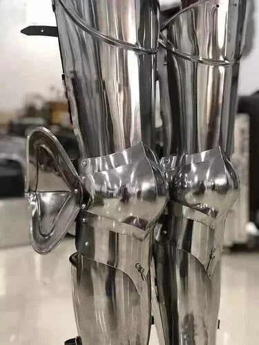 Nazgul-style ringwraith leg armor with high polish finish for display or fantasy wear.