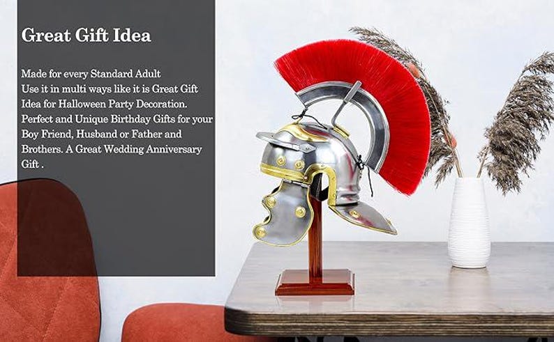 Engraved Roman helmet with red plume displayed on wooden stand