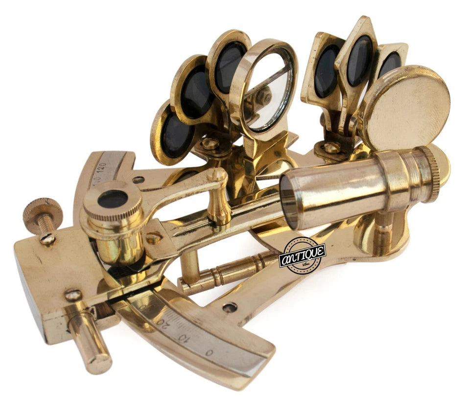 Gold sextant with visible brand logo on a white background