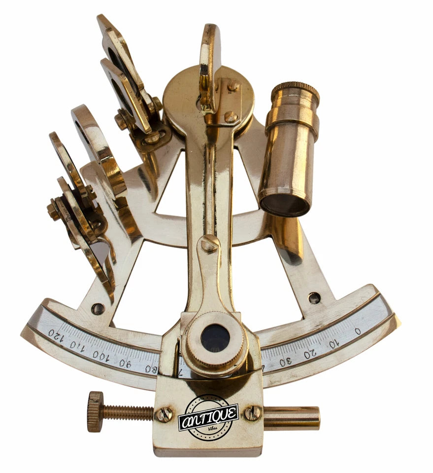 Brass sextant with 'antique' label on a white background
