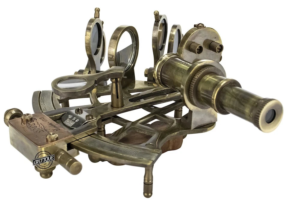 Antique sailor navigation sextant in brass with polished wooden storage box