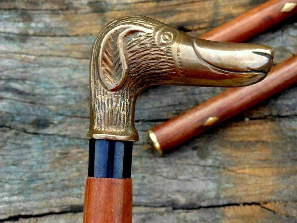 Shiny brass finish on nautical walking stick with designer dog head handle