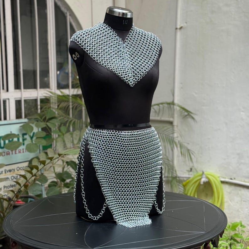 Silver chainmail top designed for curvy body types, ideal for cosplay events and edgy fashion outfits