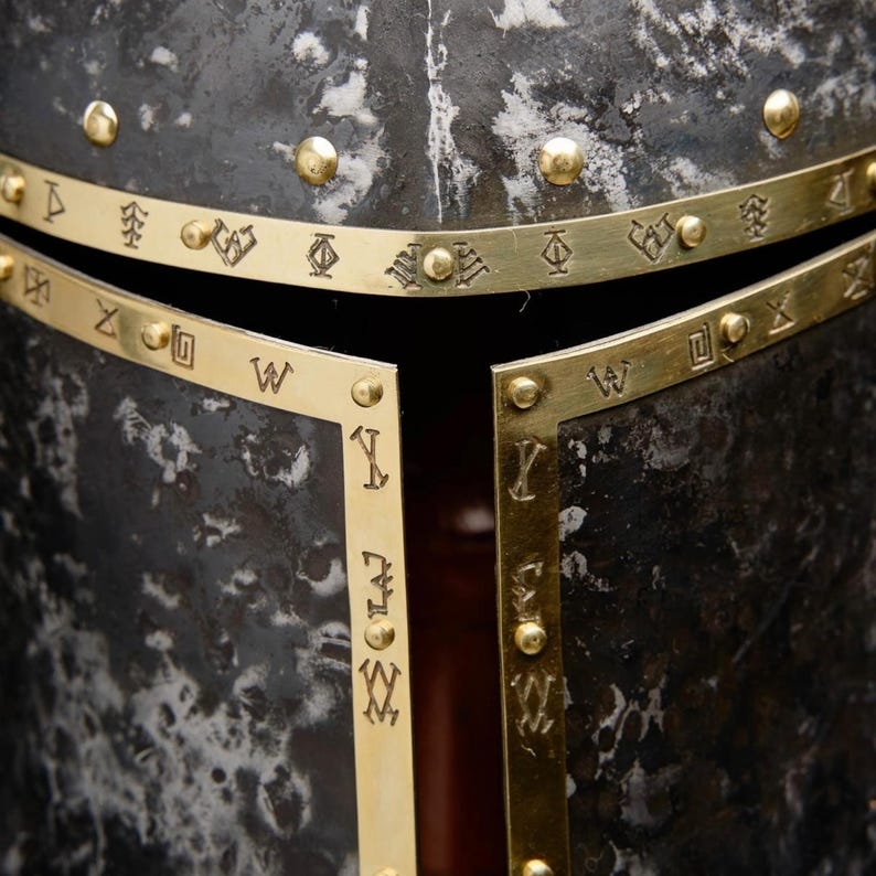Polished steel Barbuta Helmet showcasing historical design and craftsmanship