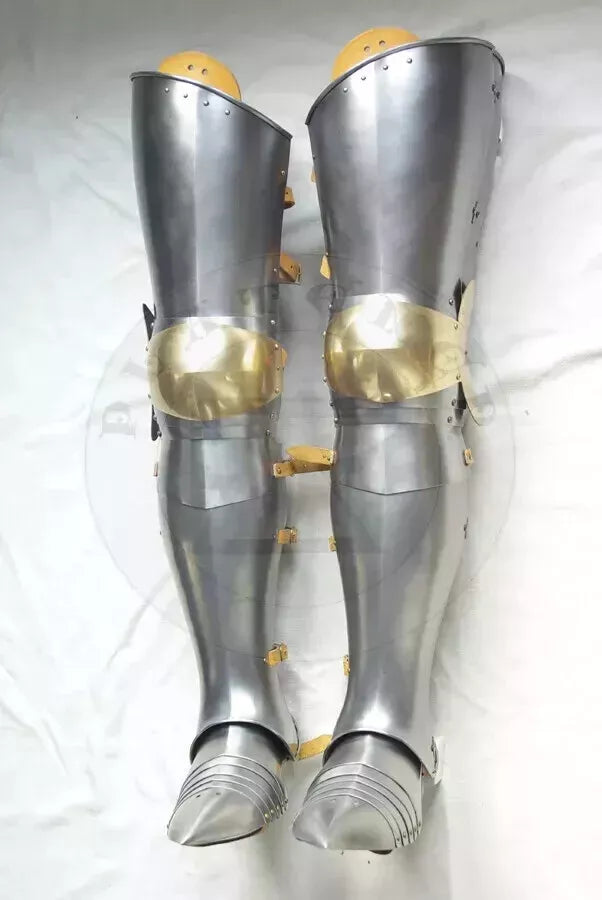 Side angle of steel knight leg armor set showing gothic thigh, greaves, and knee protection