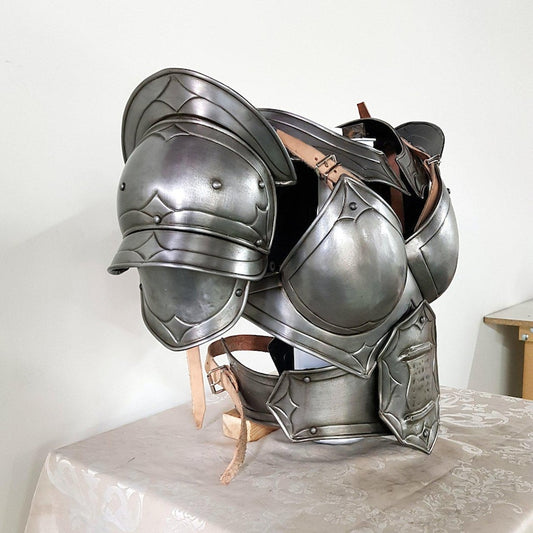 Side view showing articulated pauldrons and gorget on female armor