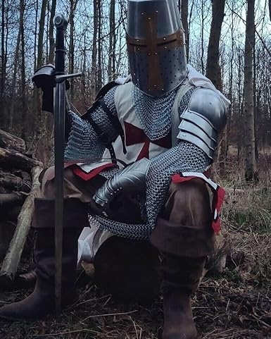 Close-up of silver polished steel armor worn as a Templar Knight Halloween costume.