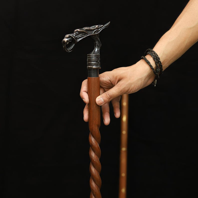 Stylish mobility aid – solid wood walking cane with vintage-inspired copper handle, ideal for collectors or themed events
