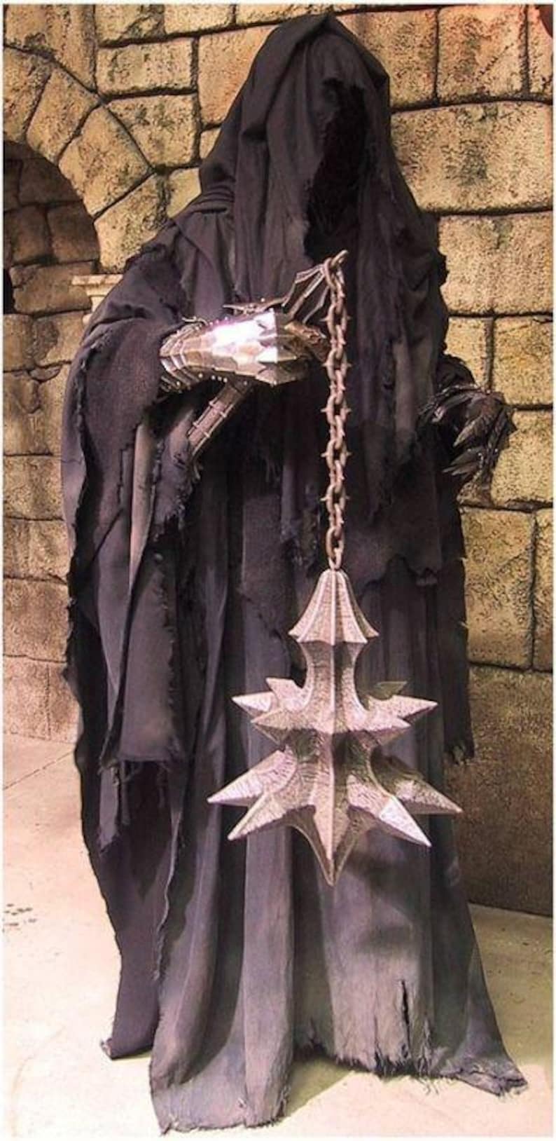 Detailed image of the tattered and layered Nazgûl cloak with weathered edges, ideal for dark fantasy or haunted roleplay.