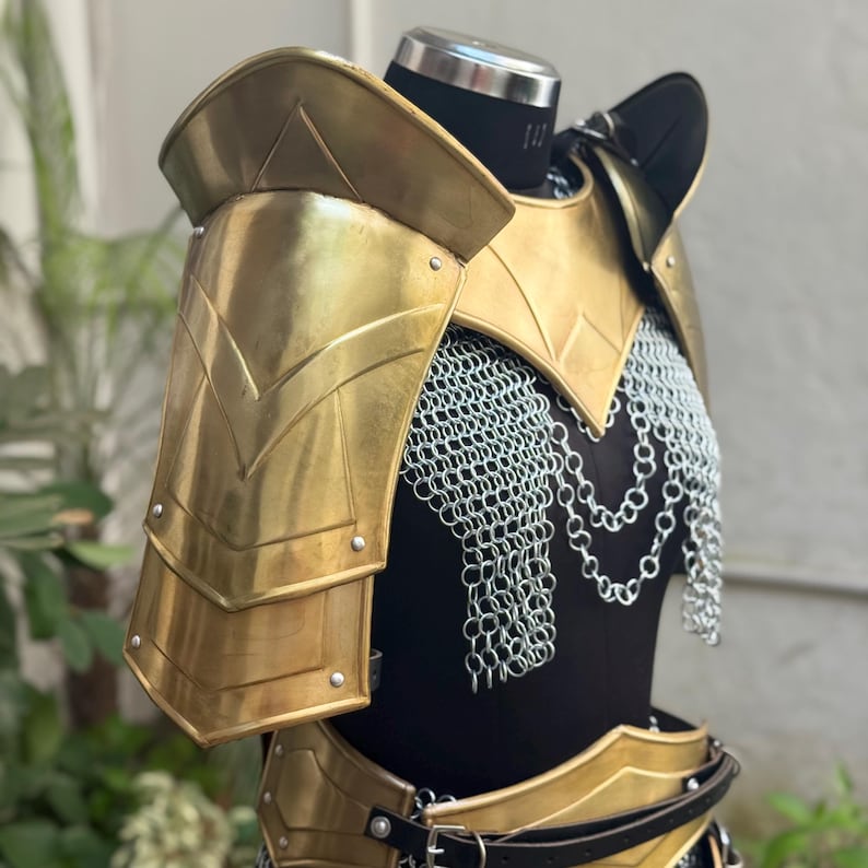 Fantasy cosplay outfit for LARP featuring Valkyrie-style golden armor and medieval bracers