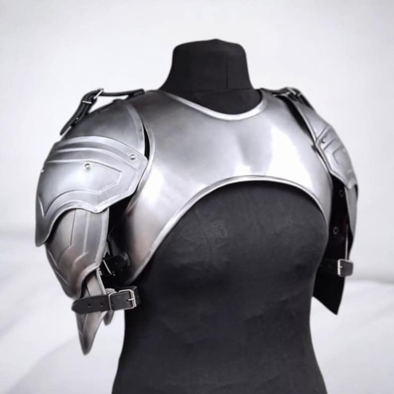 Close-up of cuirass and shoulder plate detail on handmade steel Valkyrie armor