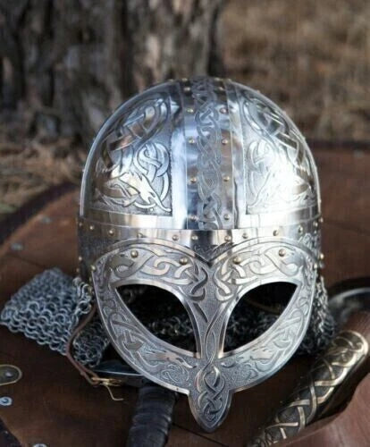 Side profile of handcrafted Viking helmet showing chainmail and detailed etching.