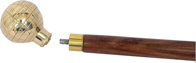 Vintage nautical-style walking cane with decorative brass globe handle