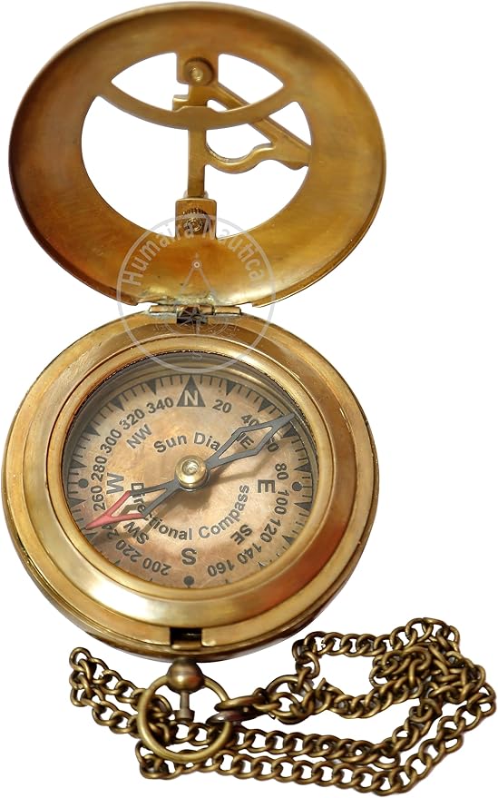 Steampunk-style brass sundial compass with attached chain and ornate detailing.