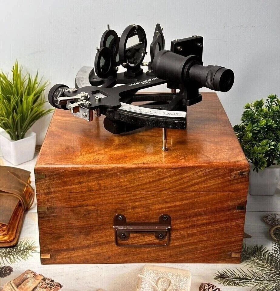 Vintage Tamaya-style sextant with black powder-coated finish used for maritime navigation