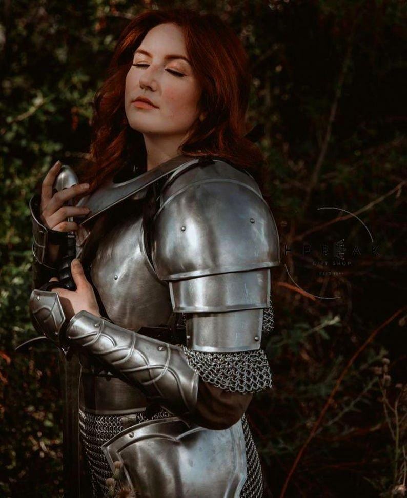 Steel gauntlets and arm bracers on the Lady Knight armor set, designed with mobility and comfort for cosplay and reenactment use.