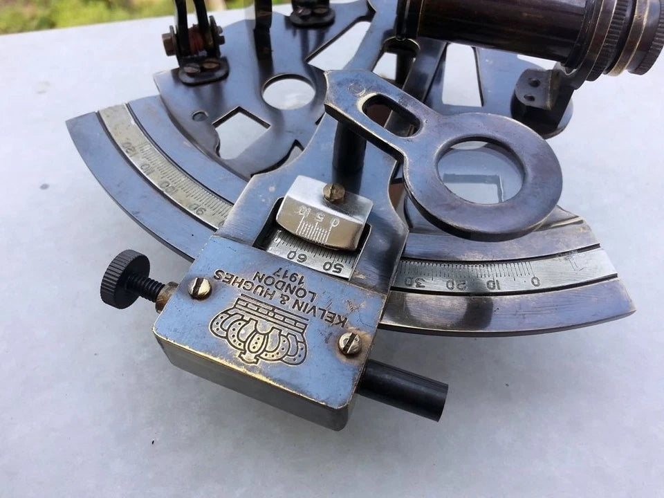 Working brass marine sextant featuring a handcrafted wooden box for display and storage