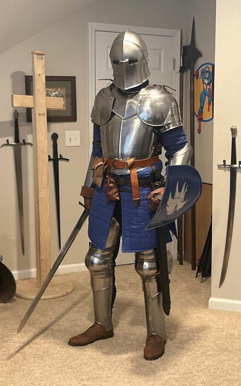 Knight armor bracers and leg guards made from 18 gauge polished steel with adjustable straps.

