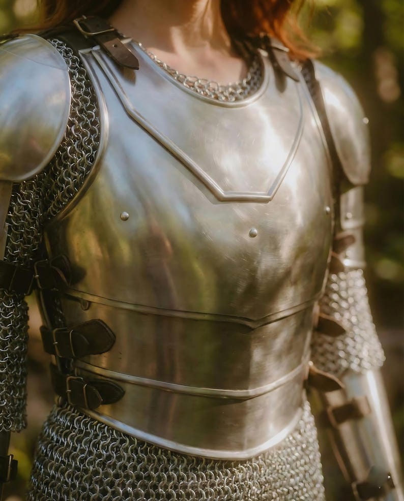 Close-up of adjustable leather straps on women’s chainmail body armor for cosplay and Ren Faire events
