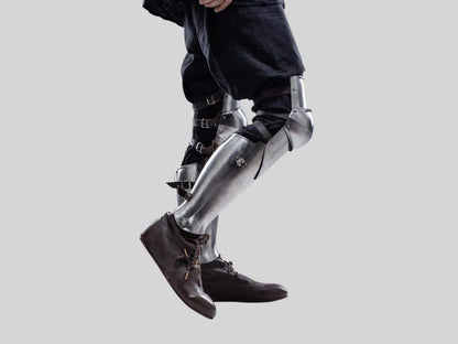 Side view of adjustable shin guards with genuine leather straps for medieval knight costume