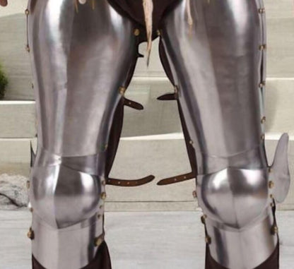 Adjustable leather straps on medieval knight leg armor for secure fit during LARP events