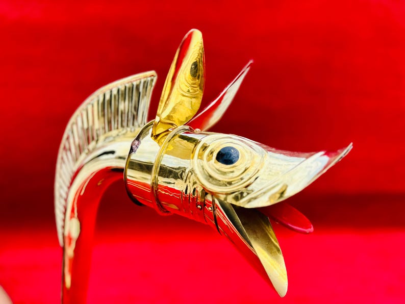 Ancient instrument replica Celtic Carnyx side view showing curved bell