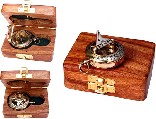 Antique brass nautical compass displayed with handcrafted wooden storage box.

