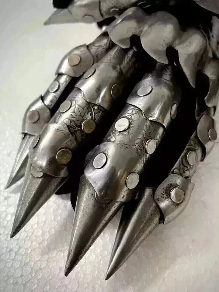 Close-up of Artisans Hub medieval gauntlets highlighting black antique finish and fine steel craftsmanship
