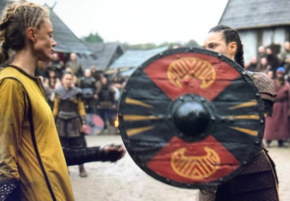Authentic Viking shield with battleworn wooden design and durable steel boss