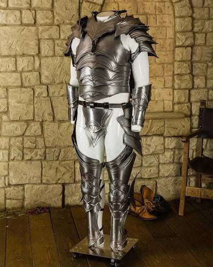 Close-up of Balthasar knight armor showing helmet and shoulder pauldrons, crafted from 18-gauge steel for medieval cosplay or reenactments by Artisans Hub.

