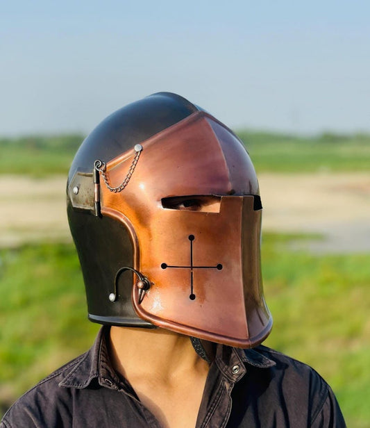 Front view of the Barbuta Helmet – a Medieval Knight Helmet with visor in copper and grey.