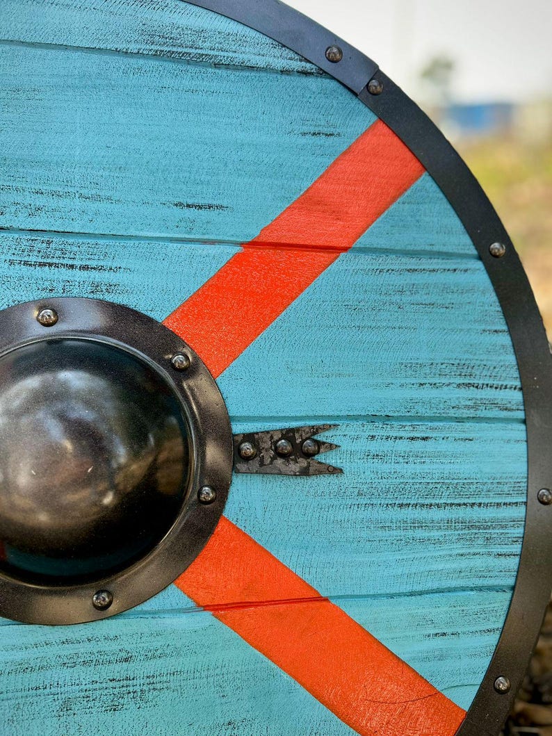 Battleworn Viking shield made with a wooden design inspired by Valhalla