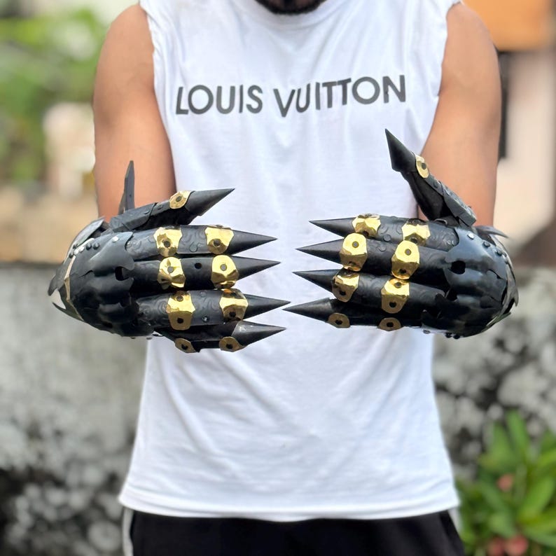 Blackened brass gothic gauntlets designed for LARP battles and dark fantasy roleplay