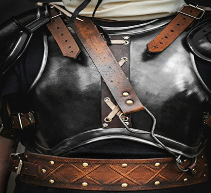 Blackened Steel Guts Armor showing forged shoulder plate details