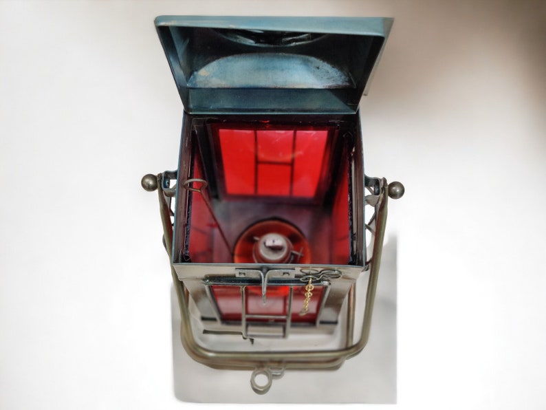 Brass lantern nautical hanging light for coastal and beach interiors