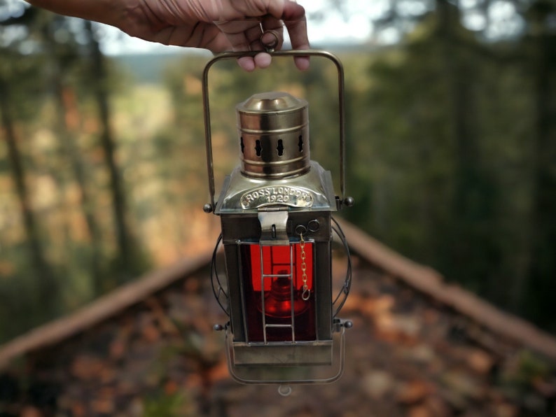 Brass lantern with red and green glass hanging oil lamp for nautical décor