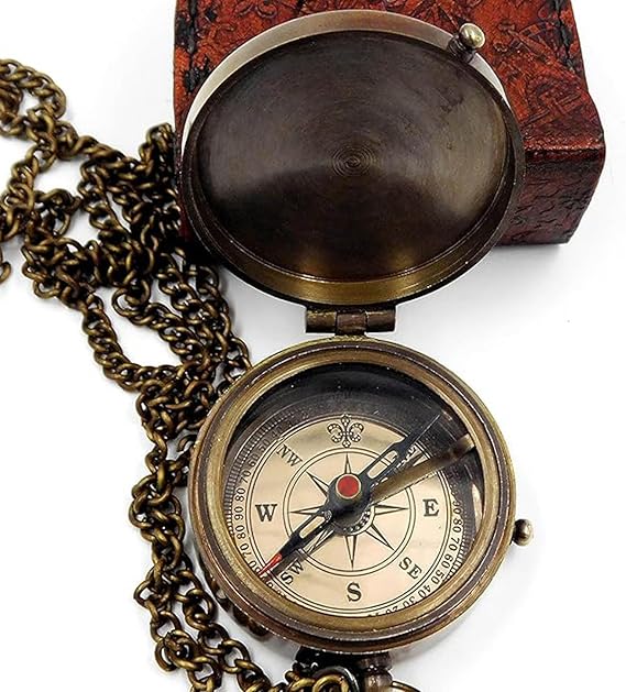 Front view of handmade brass pocket compass with antique finish.

