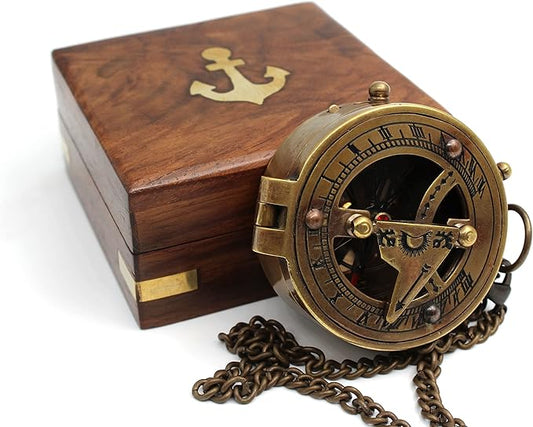 Front view of antique brass sundial compass with jeweled needle and vintage finish.

